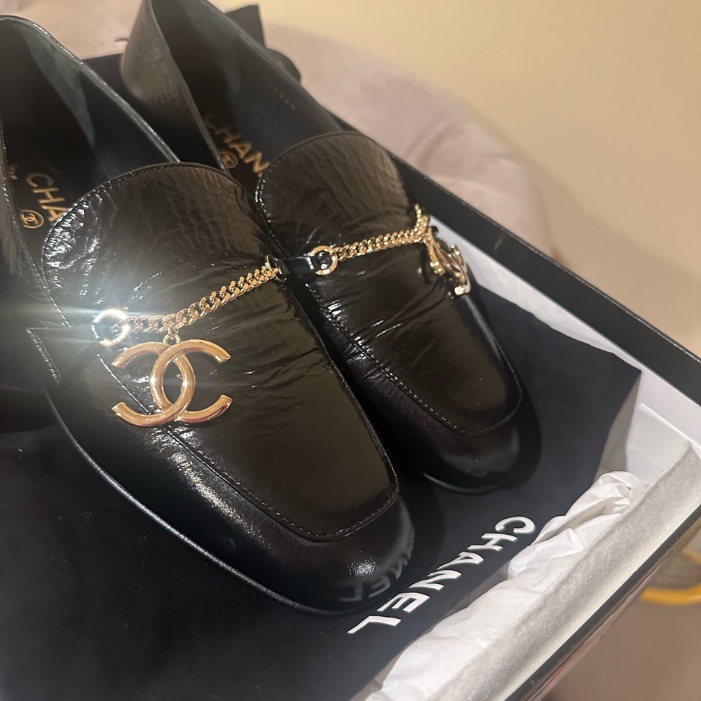 CHANEL Black Loafers with Gold Accent